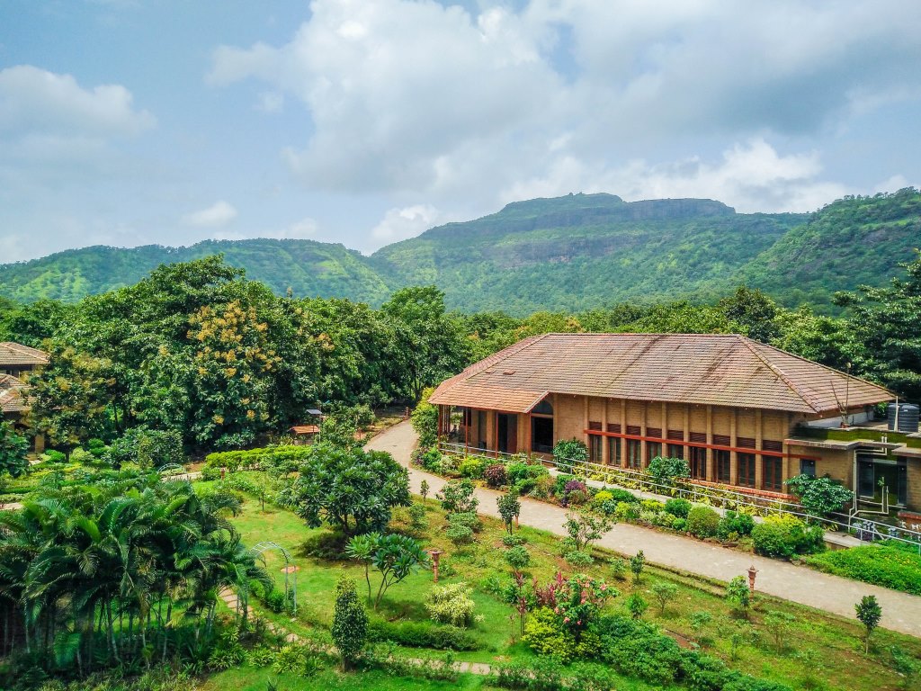 Govardhan Ecovillage temple at golden hour